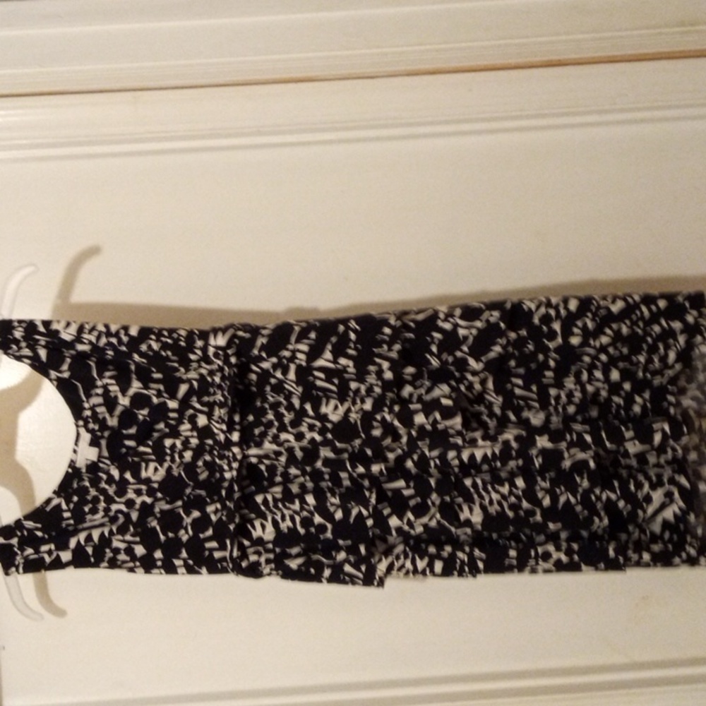 Women's short sleeved black and white designed dress with layers